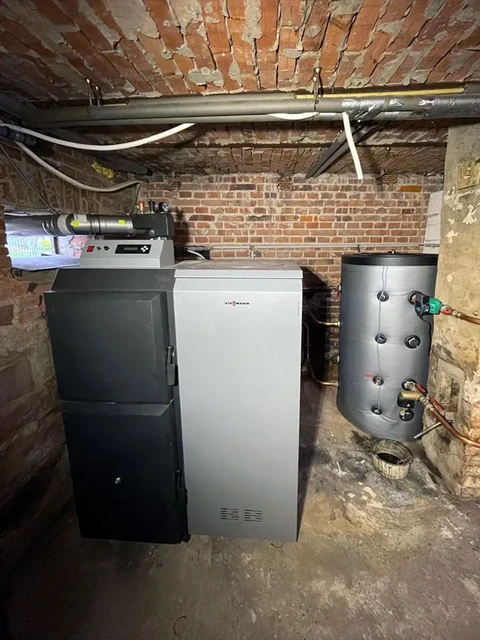 Cave voûtée en briques avec installation de chauffage domestique